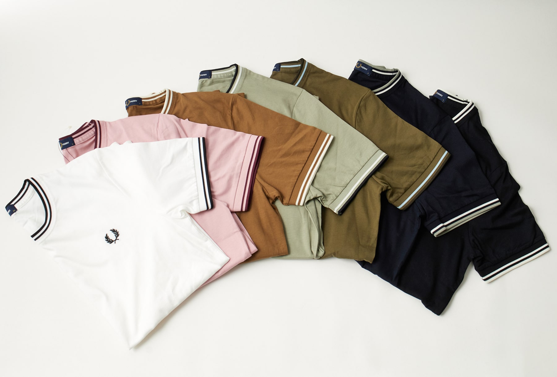 英国カルチャーの象徴 FRED PERRY(フレッドペリー)との別注Tシャツがリリース