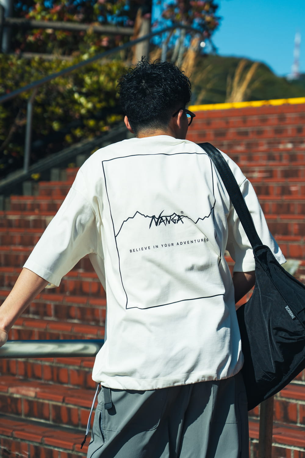 JEANSFACTORY × NANGA [ジーンズファクトリー × ナンガ] 別注 バックプリント ドローコードTシャツ [NW25SS-JF6]