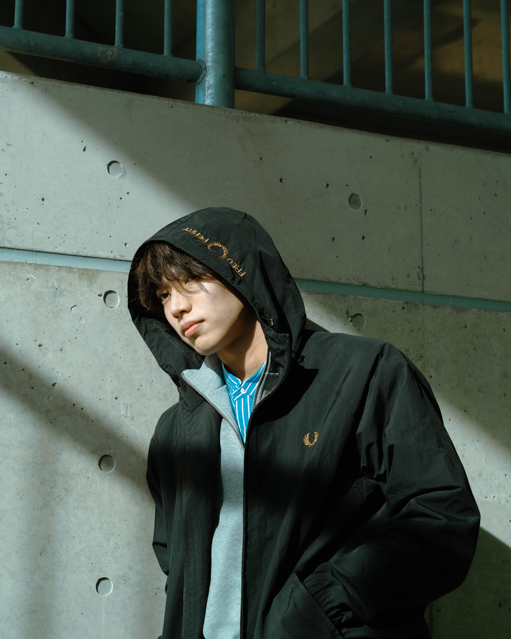 FRED PERRY [フレッドペリー] 別注 フード刺繍 ナイロンシェルジャケット [FPM-25A-031JF]です。