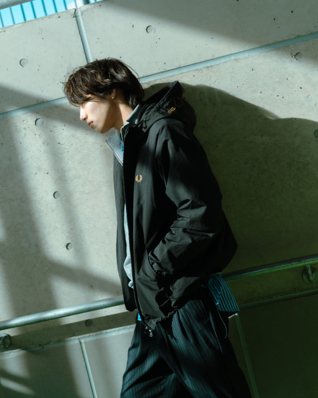 FRED PERRY [フレッドペリー] 別注 フード刺繍 ナイロンシェルジャケット [FPM-25A-031JF]です。