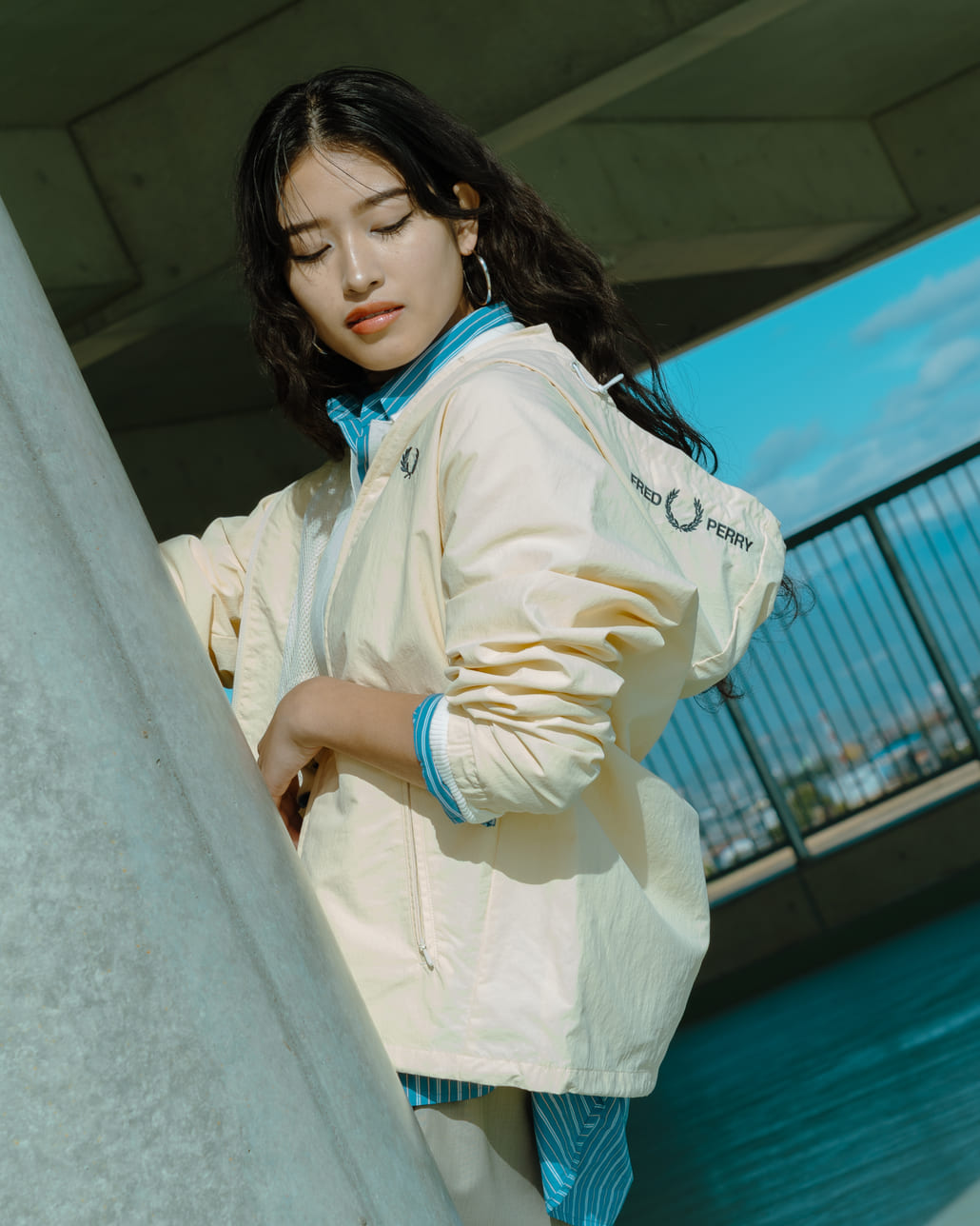 FRED PERRY [フレッドペリー] 別注 フード刺繍 ナイロンシェルジャケット [FPM-25A-031JF]です。