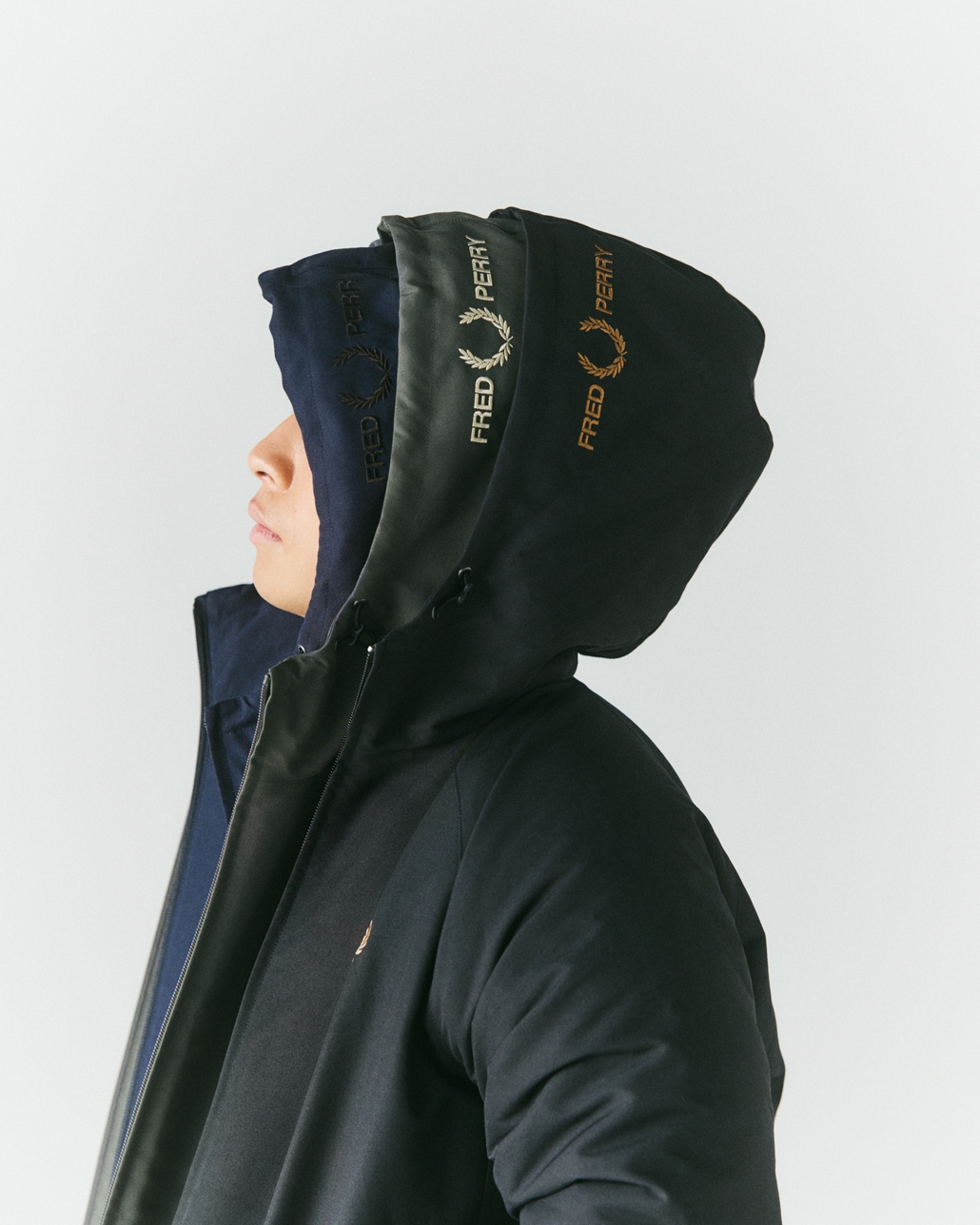 FRED PERRY [フレッドペリー] 別注 パデッド フード刺繍シェルジャケット [FPM-26A-002JF]です。