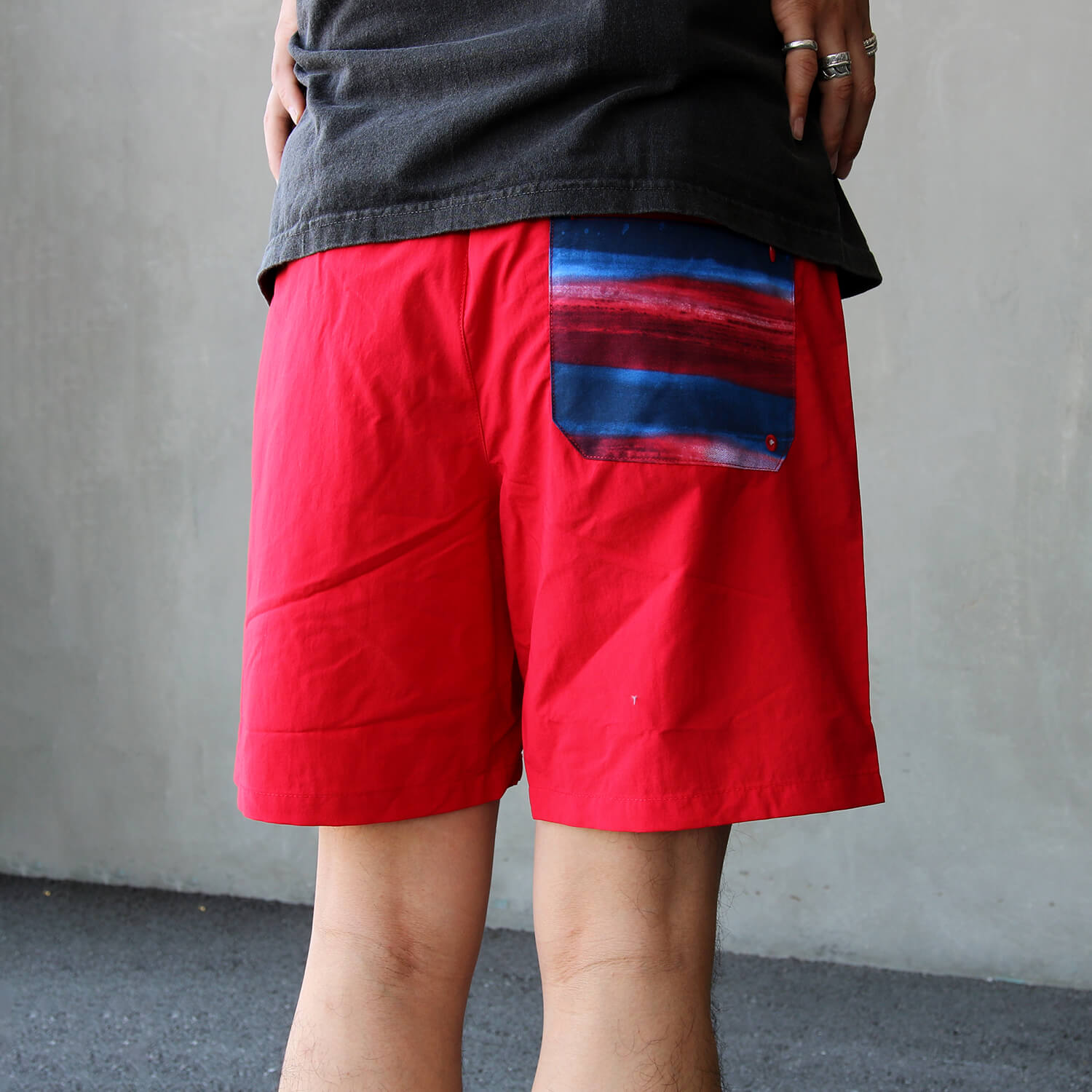 コロンビアのロータン ドリフター ウォーター ショートパンツのレッドです。